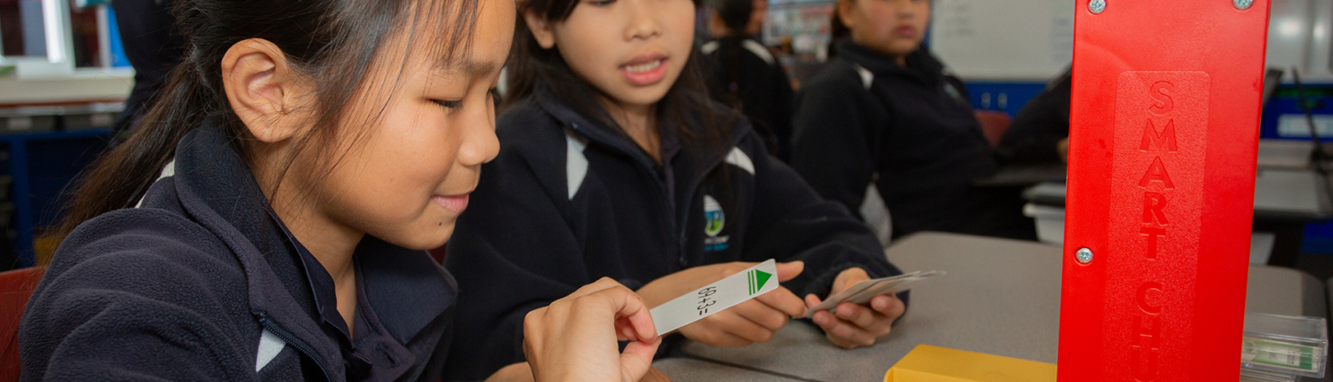 Girls learning Math Girls learning Math with cards